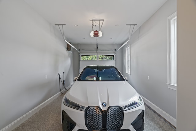 garage featuring a garage door opener