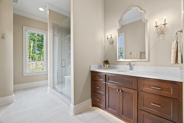 bathroom featuring walk in shower, oversized vanity, ornamental molding, and tile floors