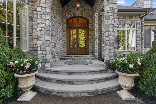 property entrance featuring french doors