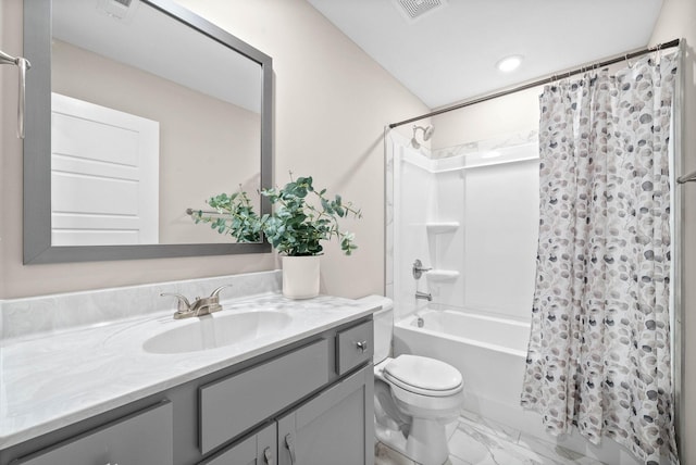 full bathroom with vanity, toilet, and shower / tub combo with curtain