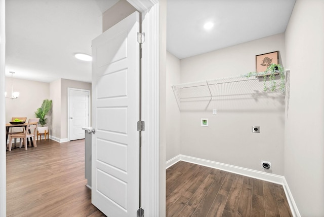 washroom featuring hookup for an electric dryer, a chandelier, dark hardwood / wood-style flooring, and washer hookup