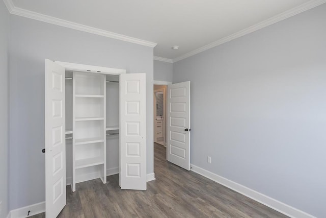 unfurnished bedroom with ornamental molding and dark wood-type flooring