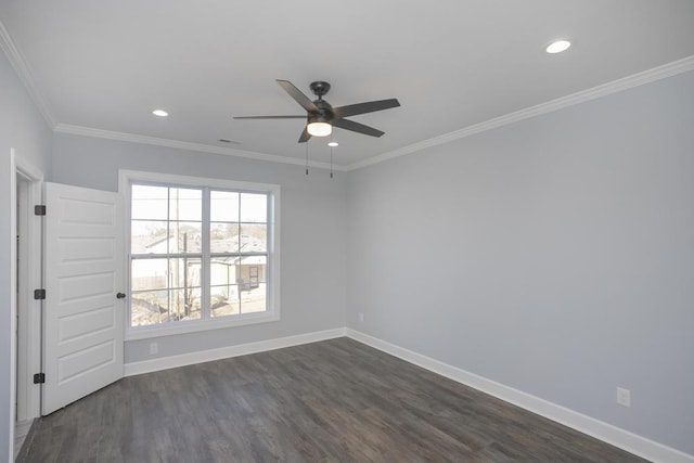 spare room with crown molding, ceiling fan, and dark wood-type flooring