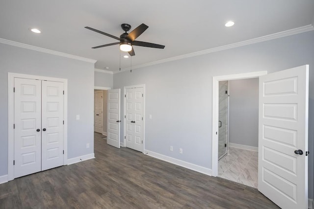 unfurnished bedroom with ceiling fan, dark hardwood / wood-style floors, and ornamental molding