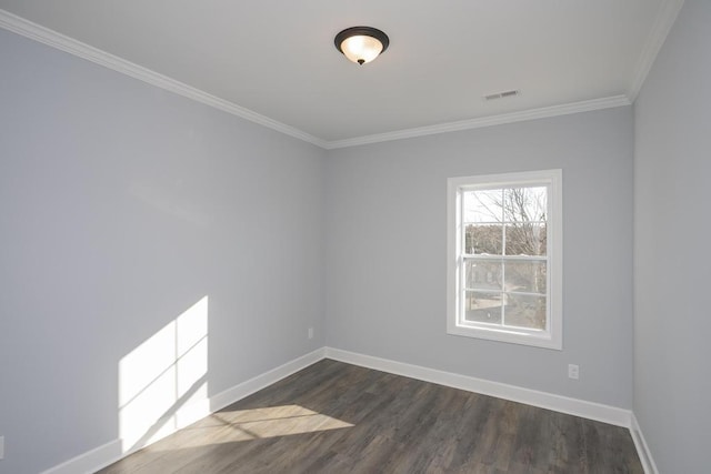 empty room with crown molding and dark hardwood / wood-style floors