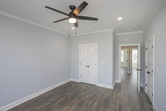 unfurnished bedroom with ceiling fan, dark hardwood / wood-style flooring, and ornamental molding