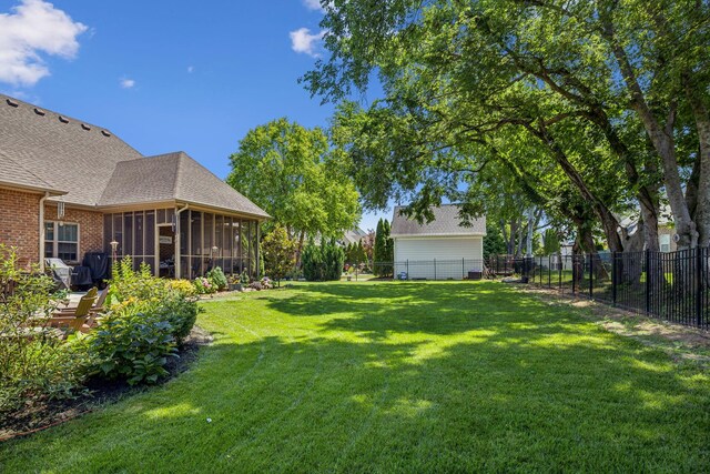 view of yard with a sunroom