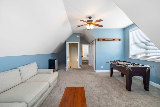 game room featuring ceiling fan, carpet floors, and lofted ceiling