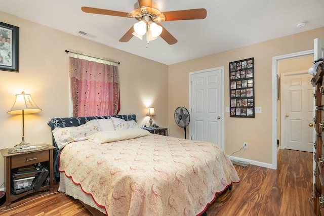 bedroom with ceiling fan and hardwood / wood-style flooring