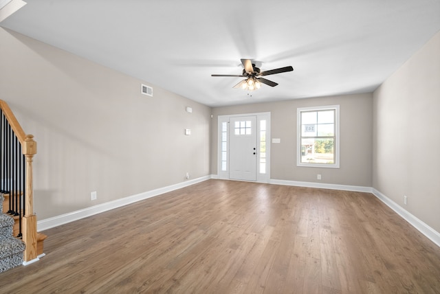 interior space featuring hardwood / wood-style flooring and ceiling fan