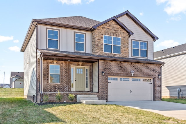 view of front of property with a front lawn and a garage