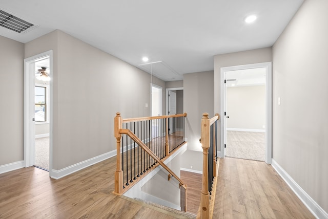 corridor featuring light hardwood / wood-style flooring