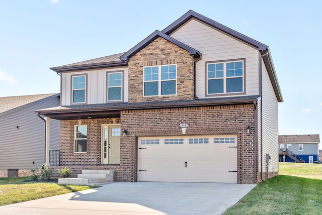 view of front facade with a front lawn and a garage