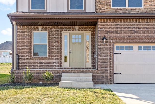 doorway to property with a yard