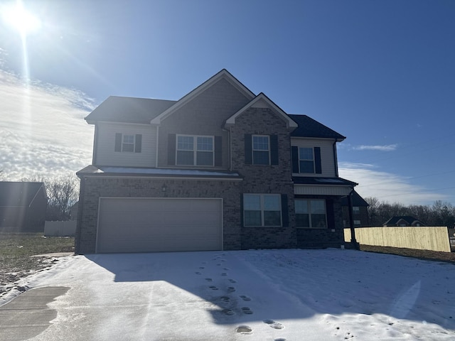 front of property with a garage