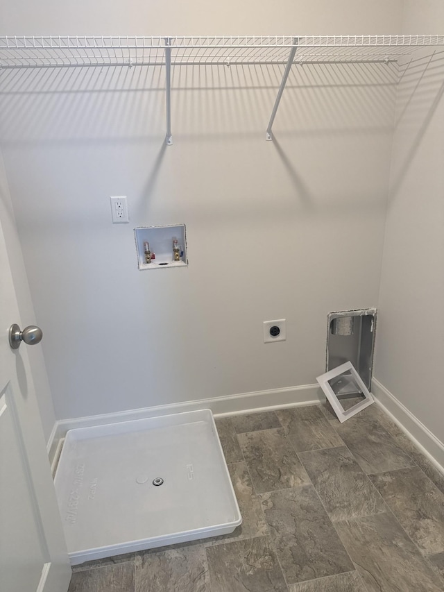 laundry area with electric dryer hookup and washer hookup