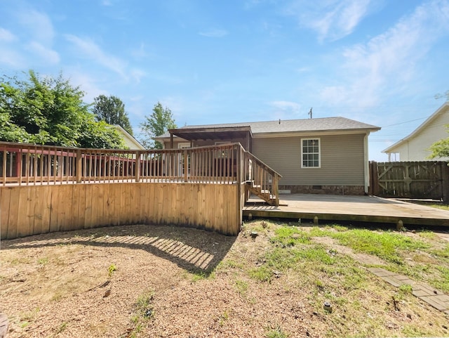 rear view of property with a deck