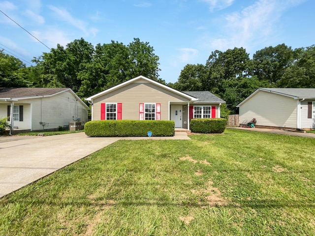 single story home featuring a front yard