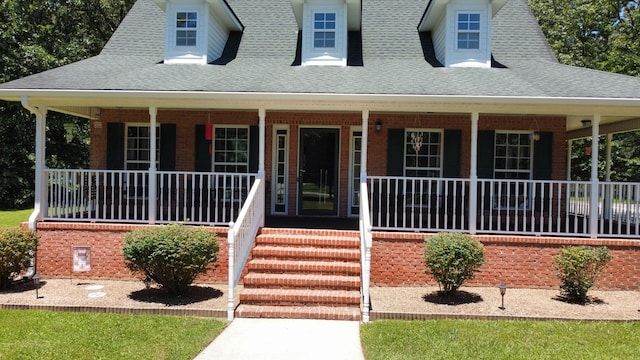 view of front of house featuring covered porch