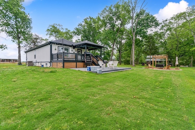 view of yard featuring a pergola and a deck