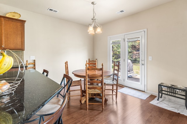 dining area featuring hardwood / wood-style flooring