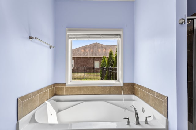 bathroom with a washtub