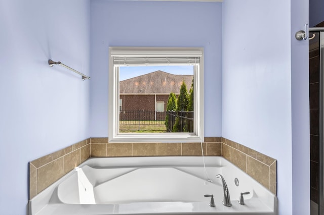 full bathroom featuring a bath