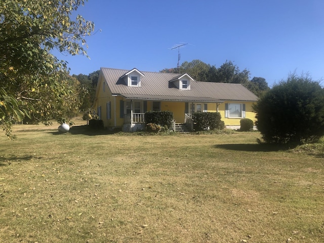 view of front of home featuring a front lawn and a porch