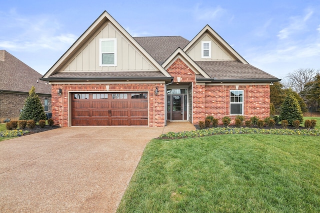 craftsman-style house featuring a garage and a front yard