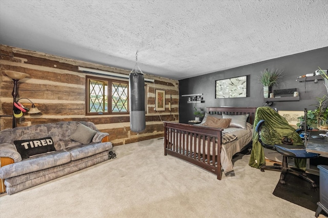 bedroom featuring carpet flooring, a textured ceiling, and wooden walls