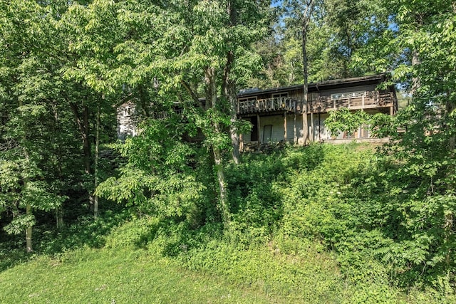 back of house featuring a deck