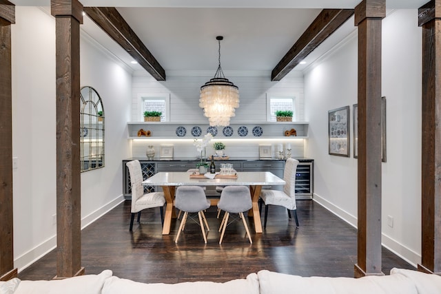 dining area featuring beam ceiling, a chandelier, decorative columns, and dark hardwood / wood-style flooring