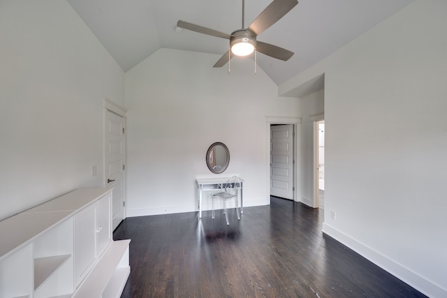 interior space featuring high vaulted ceiling, dark wood-type flooring, and ceiling fan