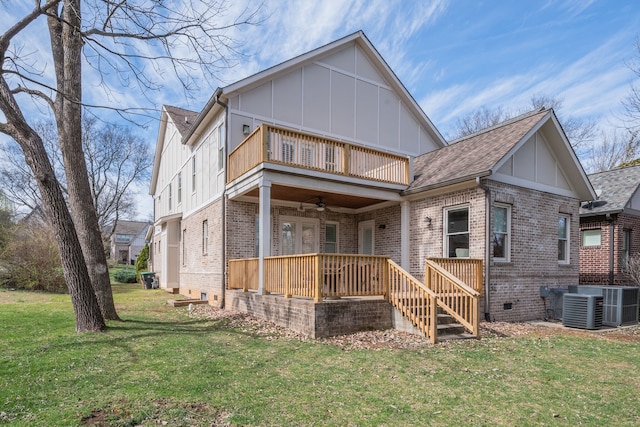 back of property featuring central AC, a yard, and ceiling fan