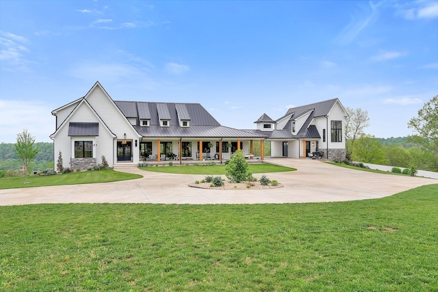 view of front facade with a porch and a front lawn