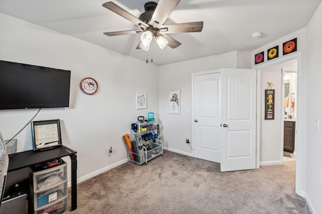 interior space with ceiling fan