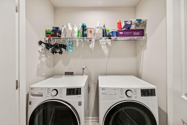 washroom featuring separate washer and dryer