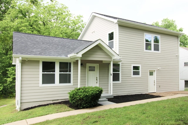 view of front of home with a front lawn