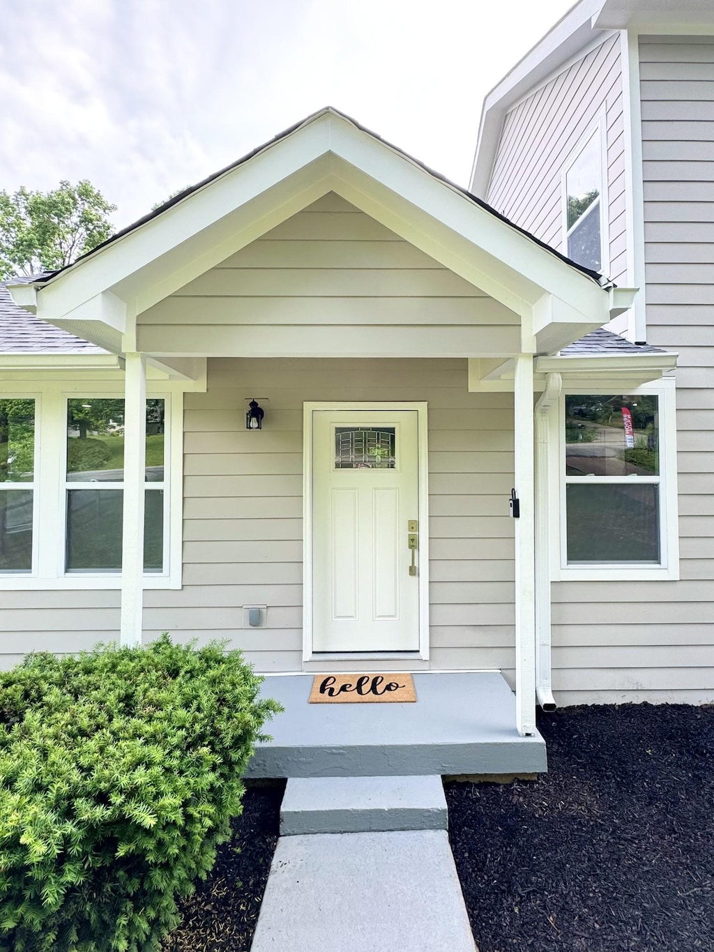 entrance to property with covered porch