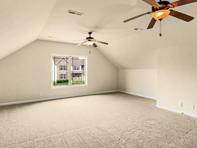 bonus room with carpet, vaulted ceiling, and ceiling fan