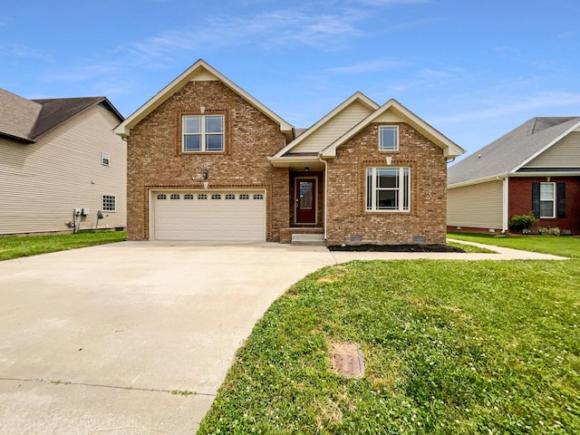 view of front facade with a front yard and a garage