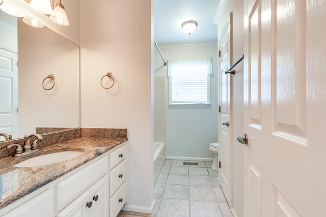 bathroom featuring tile patterned floors, vanity, toilet, and crown molding