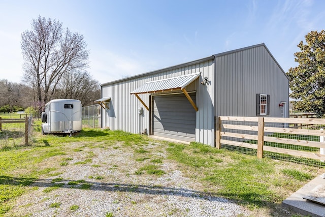 exterior space with an outbuilding