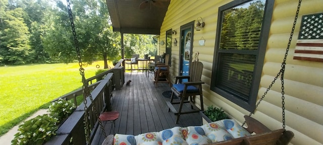 deck featuring a lawn