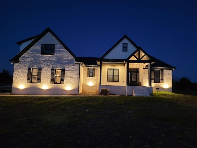 view of front of house with a lawn