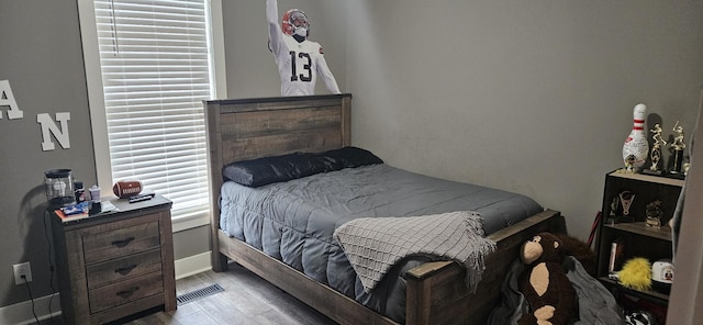 bedroom featuring light wood-type flooring