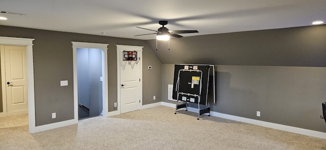 bedroom featuring ceiling fan, light colored carpet, and lofted ceiling