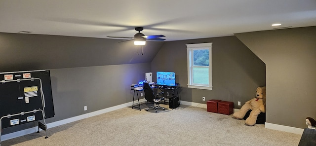 office space featuring light colored carpet, ceiling fan, and lofted ceiling