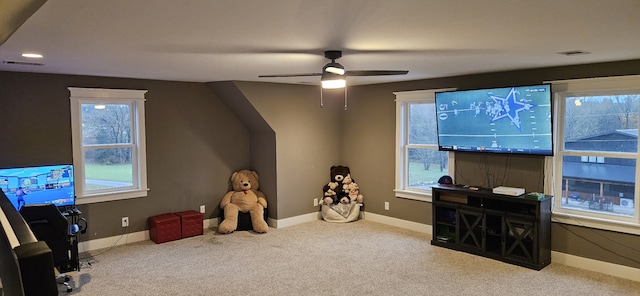 game room featuring ceiling fan and light colored carpet