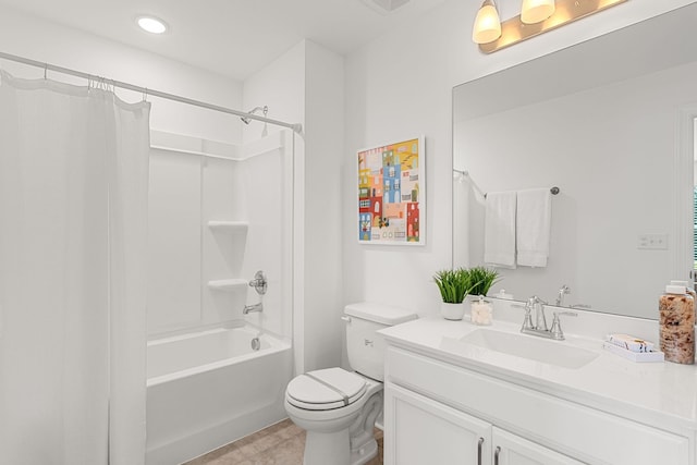 full bathroom featuring shower / bath combination with curtain, vanity, and toilet